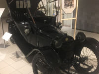 Pioneers in African American Auto display with antique black car