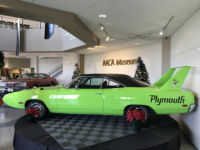 green plymouth car age of aquarius display