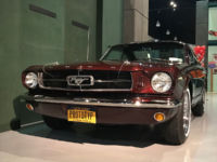 antique red ford mustang