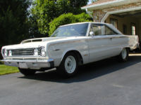 white plymouth car