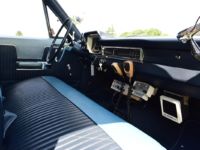 vintage plymouth police car front seat