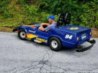 man driving hersheypark mini turnpike car