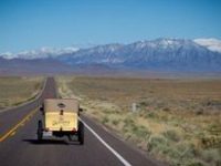 Ford Model T driving on road